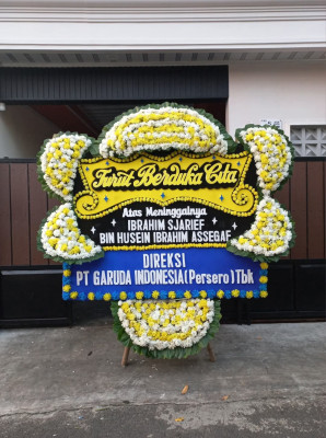 Papan Bunga Duka di Skanto
