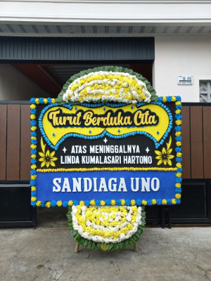 Papan Bunga Duka di Skanto